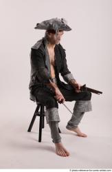 JACK PIRATE SITTING POSE WITH GUN AND DAGGER